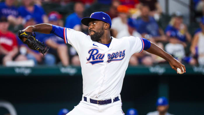 May 12, 2022; Arlington, Texas, USA; Texas Rangers starting pitcher Taylor Hearn (52) throws during the first inning against the Kansas City Royals at Globe Life Field.