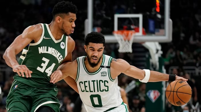 Boston Celtics’ Jayson Tatum tries to get past Milwaukee Bucks’ Giannis Antetokounmpo during the second half of Game 6 of an NBA basketball Eastern Conference semifinals playoff series Friday, May 13, 2022, in Milwaukee.