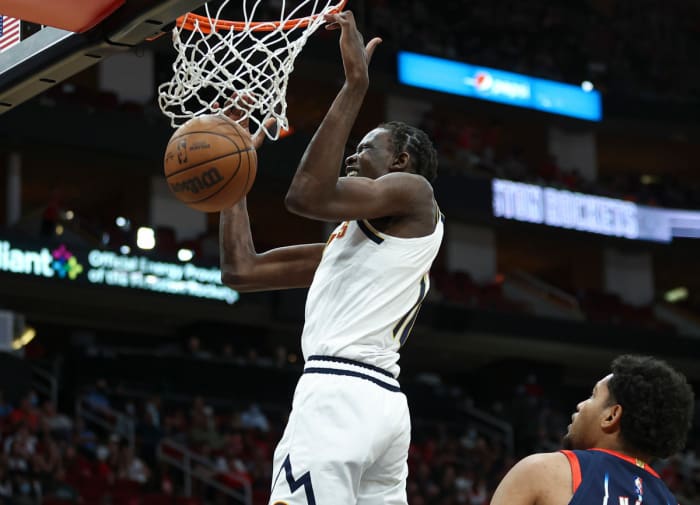 Denver Nuggets Heart Bowl (10) dunks the ball during the fourth quarter against the Houston Rockets at Toyota Center.
