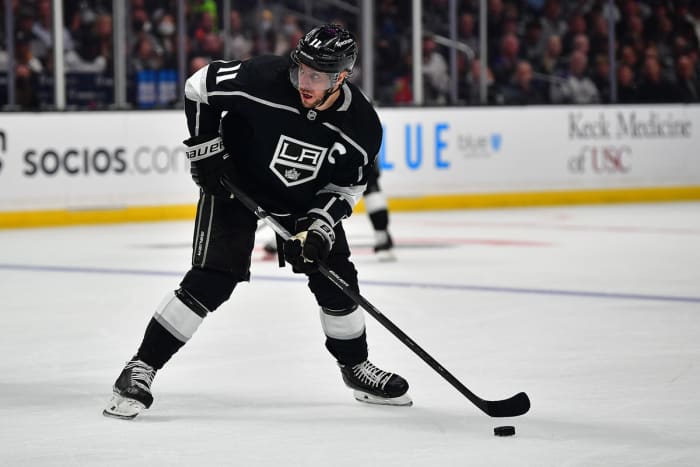 May 12, 2022;  Los Angeles, California, United States;  Los Angeles Kings center Anze Kopitar (11) controls the puck against the Edmonton Oilers during the second period in game six of the first round of the 2022 Stanley Cup Playoffs at Crypto.com Arena.  Mandatory Credit: Gary A. Vasquez-USA TODAY Sports