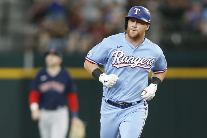 15 May 2022;  Arlington, Texas, USA;  Texas Rangers right-hander Kole Calhoun (56) rounds base after a home run against the Boston Red Sox in the sixth inning at Globe Life Field.