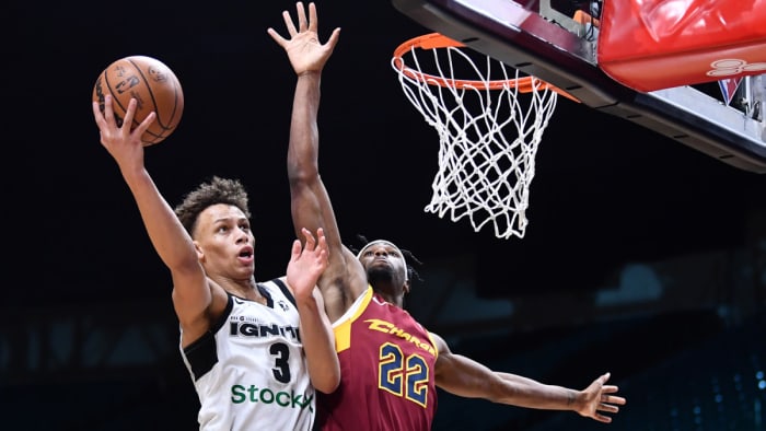 G League Ignite guard Dyson Daniels (3) drives to the basket against Cleveland Charge guard R.J. Nembhard (22) during the second half of the NBA G League Next Gem Game at the Wolstein Center.