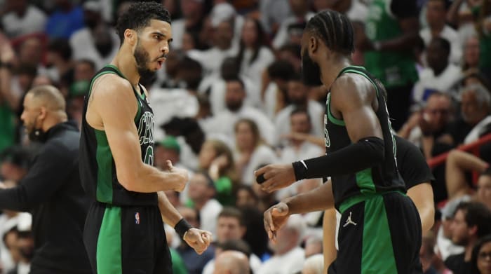 Boston Celtics forward Jayson Tatum (0) celebrates with guard Jaylen Brown (7) during the fourth quarter of game five of the 2022 eastern conference finals against the Miami Heat at FTX Arena.