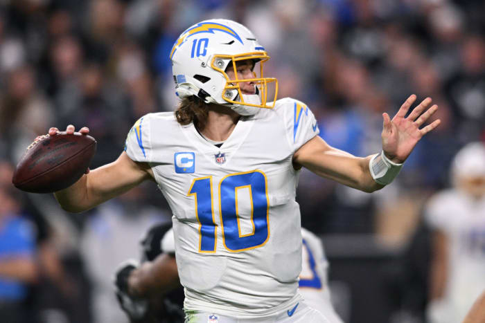 Los Angeles Chargers quarterback Justin Herbert (10) throws a pass to the Las Vegas Raiders in the second half at Allegiant Stadium.