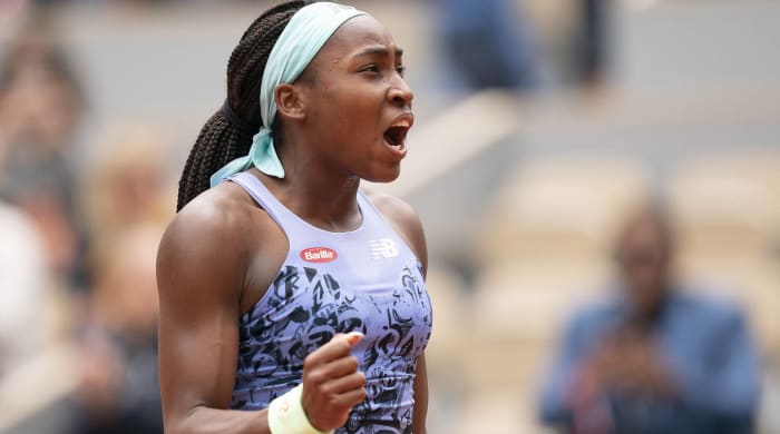 Coco Gauff celebrates victory at the French Open.