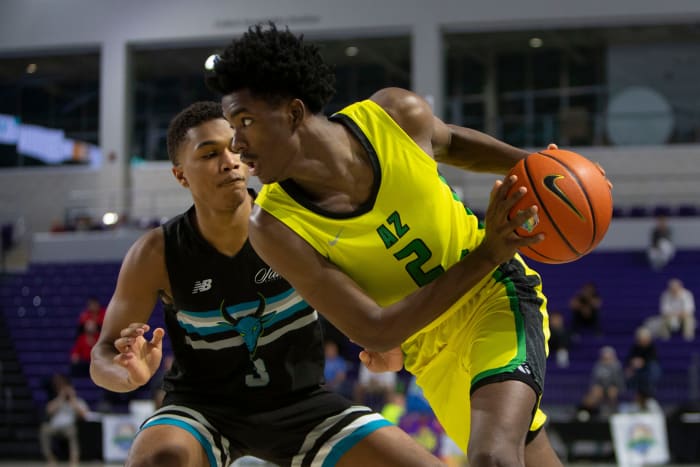 AZ Compass Prep's Chance Westry (2) looks for an opening against Combine Academy's Preston Murphy, Jr. (3) during the second half of the 48th annual City of Palms Classic Signature Series championship between AZ Compass Prep and Combine Academy, Tuesday, Dec. 21, 2021, at Suncoast Credit Union Arena in Fort Myers, Fla.AZ Compass Prep defeated Combine Academy 58-43. City of Palms Classic 2021: AZ Compass Prep vs. Combine Academy Signature Series championship