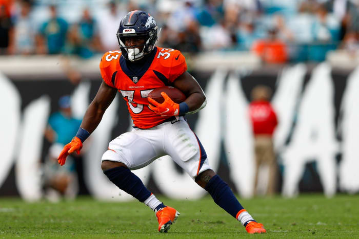 Denver Broncos running back Javonte Williams, 33, will run with the ball in the fourth quarter against the Jacksonville Jaguars at TIAA Bank Field.