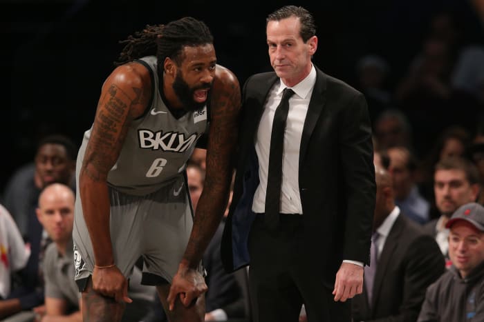 Brooklyn Nets center DeAndre Jordan (6) talks to head coach Kenny Atkinson during the fourth quarter against the Charlotte Hornets at Barclays Center.