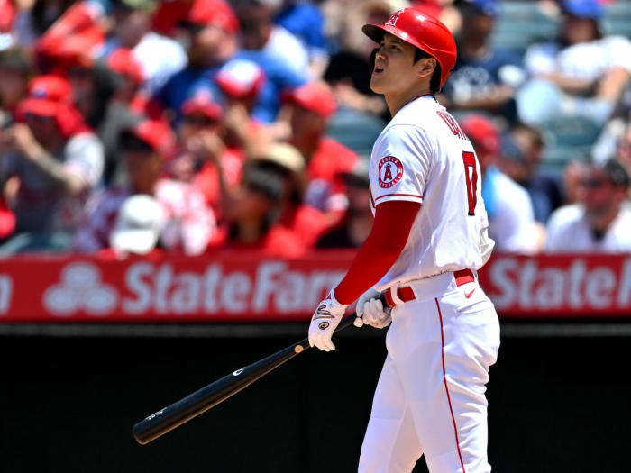 Angels designated hitter Shohei Ohtani watches the ball clear the wall in the third inning on a two run home run, his second of the game, against the Blue Jays at Angel Stadium.