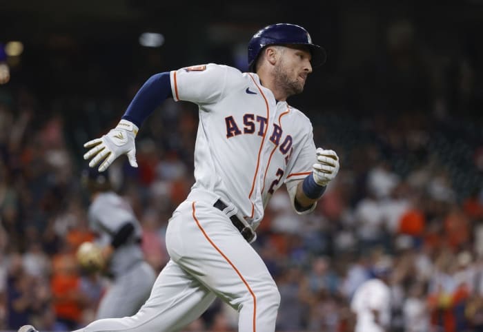 May 24, 2022; Houston, Texas, USA; Houston Astros third baseman Alex Bregman (2) runs to first base on an RBI double during the third inning against the Cleveland Guardians at Minute Maid Park. Mandatory Credit: Troy Taormina-USA TODAY Sports