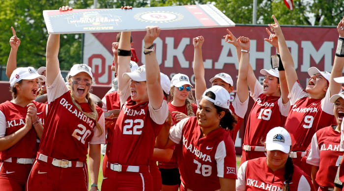The Oklahoma Sooners softball team celebrates a win over UCF in the Super Regionals