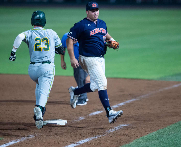 Auburn Tigers infielder Sonny DiChiara (17) beats Southeastern Louisiana Lions infielder Pierce Leavengood (23) to first base to secure the final out of the game during the NCAA regional baseball tournament at Plainsman Park in Auburn, Ala., on Friday, June 3, 2022. Auburn Tigers defeated Southeastern Louisiana Lions 19-7.