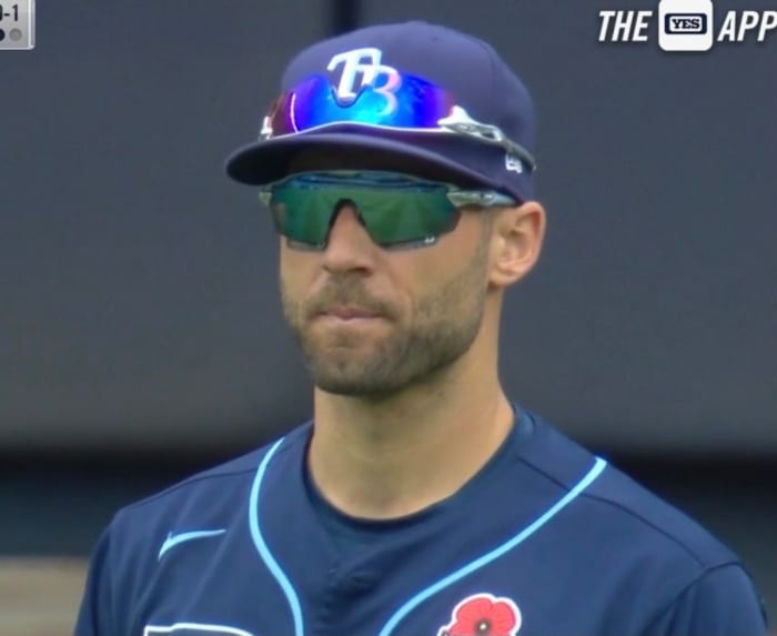 Kevin Kiermaier wearing sunglasses, with another pair on top of his hat