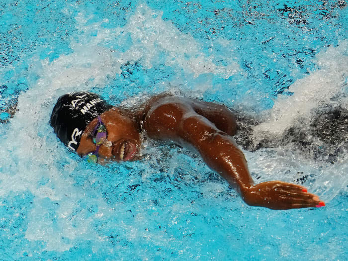 Simone Manuel swims in the women's 100-meter freestyle preliminaries during the US Olympic Team Trials swimming competition at CHI Health Center Omaha.