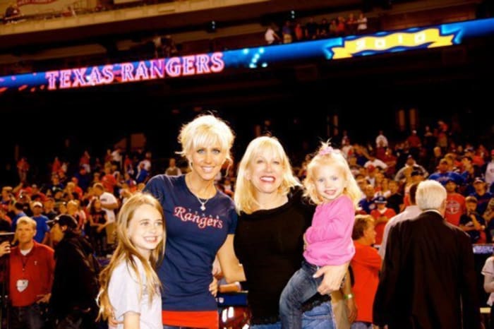 Katie with Julia; Katie's mother, Janice; and Sierra in 2010.