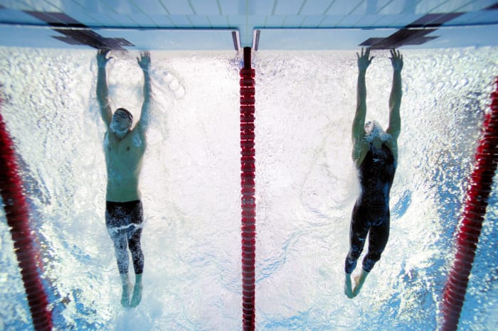 The iconic underwater photo of Michael Phelps and Milorad Cavic of Serbia in the 100 meter race at the 2008 Beijing Olympics. Phelps won by 0.01 seconds.