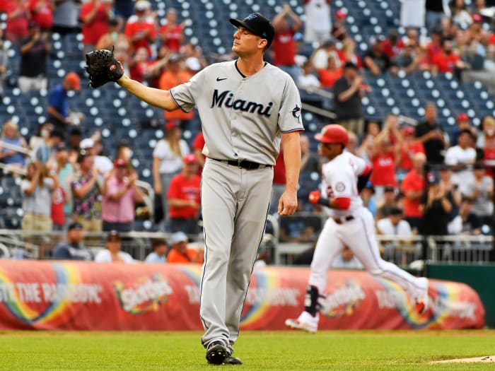 July 19, 2021;  Washington, District of Columbia, United States;  Miami Marlins reliever Ross Detwiler (54) reacts after allowing a two-run homer to Washington Nationals left fielder Juan Soto (22) at the National Park.
