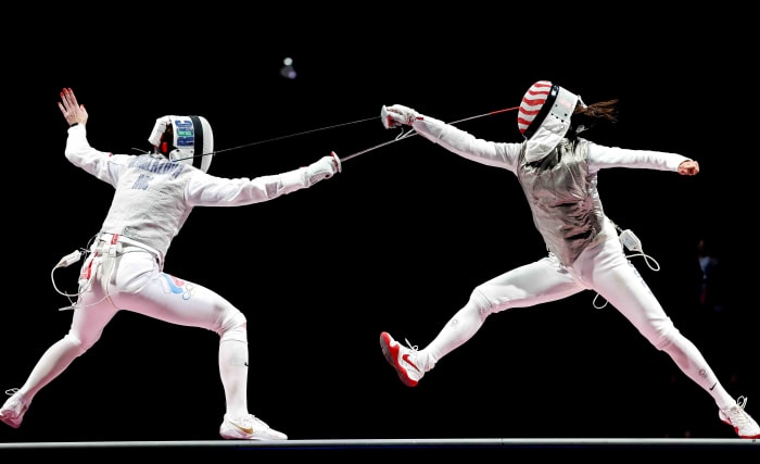Kiefer (right) defeated Russia's Inna Derglazova on July 25 and became the first American ever to capture gold in individual foil.