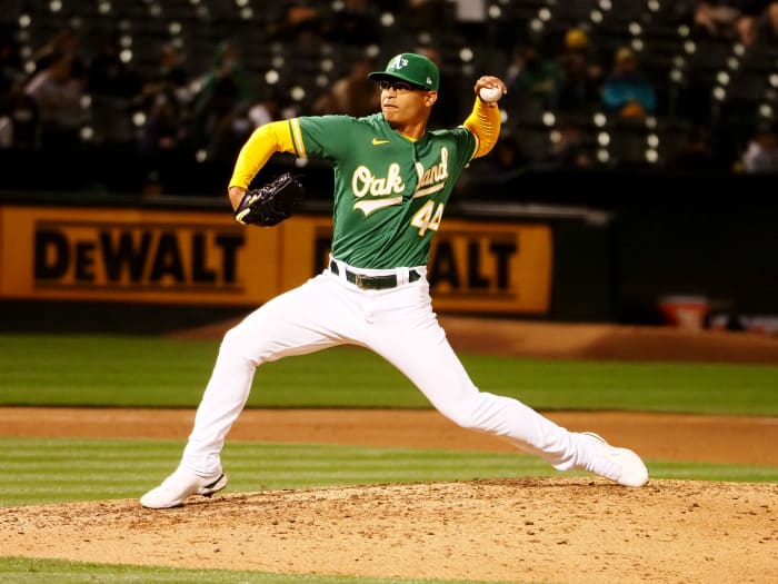 June 10, 2021;  Oakland, California, United States;  Oakland Athletics reliever Jesús Luzardo (44) throws the ball against the Kansas City Royals during the eighth inning at the RingCentral Coliseum.