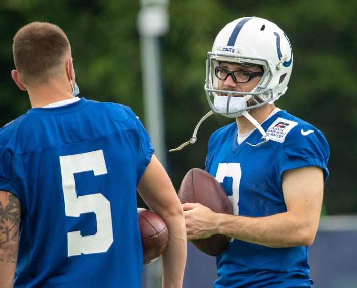 Indianapolis Colts kicker Eddy Pineiro (5) chats with Indianapolis Colts kicker Rodrigo Blankenship (3) at the start of practice at Grand Park in Westfield on Thursday, July 29, 2021, on the second full day of workouts of this summer's Colts training camp. Colts Camp Revs Up