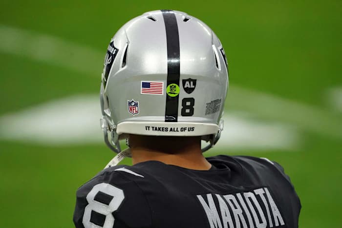 Dec 13, 2020; Paradise, Nevada, USA; Detailed view of the helmet of Las Vegas Raiders quarterback Marcus Mariota (8) with the words \"It takes all of us\" during the game against the Indianapolis Colts at Allegiant Stadium. Mandatory Credit: Kirby Lee-USA TODAY Sports