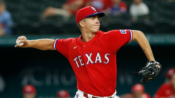 Aug 27, 2021; Arlington, Texas, USA; Texas Rangers Starting pitcher Glenn Otto (49) throws a pitch in the first inning against the Houston Astros at Globe Life Field.
