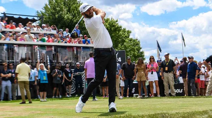 Dustin Johnson tees off at the 2022 LIV Golf Invitational Bedminster event.