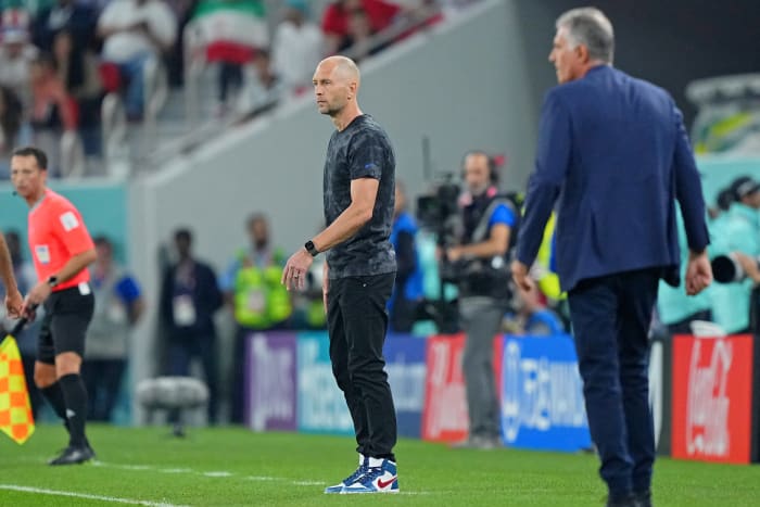 Gregg Berhalter looks on during a World Cup match.