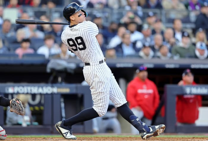 Yankees right fielder Aaron Judge hits a home run against the Guardians.