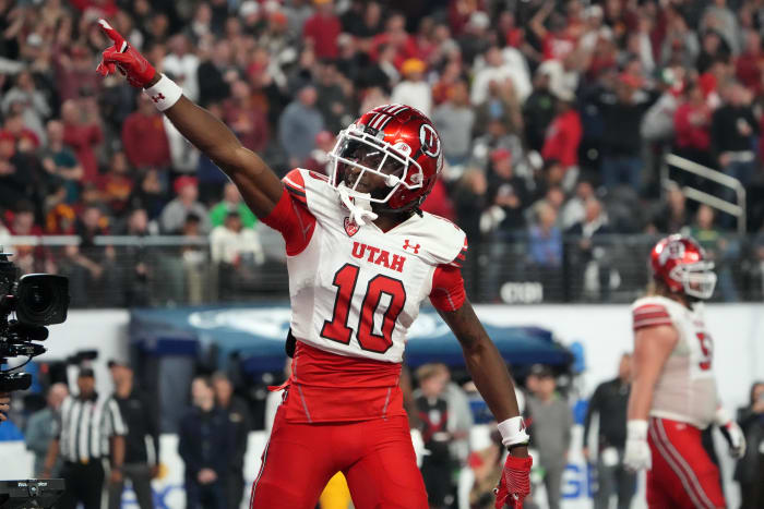 Utah Utes wide receiver Money Parks (10) celebrates after scoring on a 57-yard touchdown reception against the Southern California Trojans in the second half of the Pac-12 Championship at Allegiant St.
