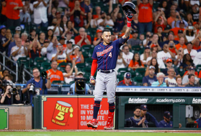 Former Twins shortstop Carlos Correa waves to the crowd before an at-bat during the first inning against the Astros, his first team, at Minute Maid Park.