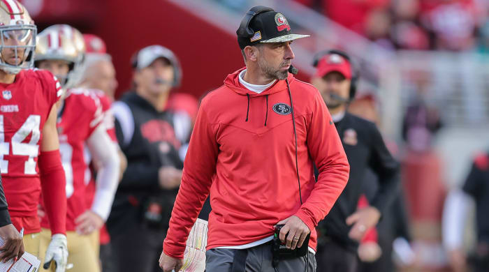 Kyle Shanahan watches the field from the 49ers sideline