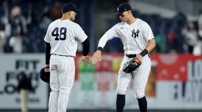Yankees first baseman Anthony Rizzo and outfielder Aaron Judge celebrate after defeating the Orioles at Yankee Stadium.