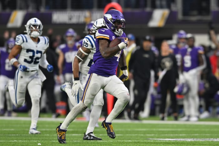 Vikings running back Dalvin Cook breaks a screen pass for a 64-yard touchdown reception against the Colts.