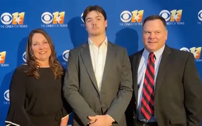 Jackson Arnold and his parents, Sharon and Todd, at the Landry Award ceremony.