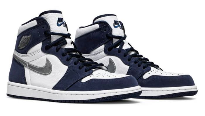 Navy and white Air Jordan shoes.
