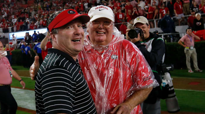 Georgia coach Kirby Smart with his father Sonny Smart.