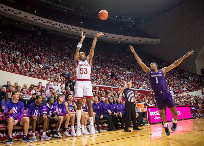 Indiana's Tamar Bates (53) makes a three point during the first half of the Indiana vs. Northwestern basketball game.
