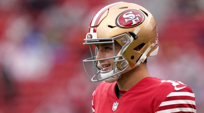 49ers quarterback Brock Purdy smiles during warmups before the wild-card game vs. the Seahawks.