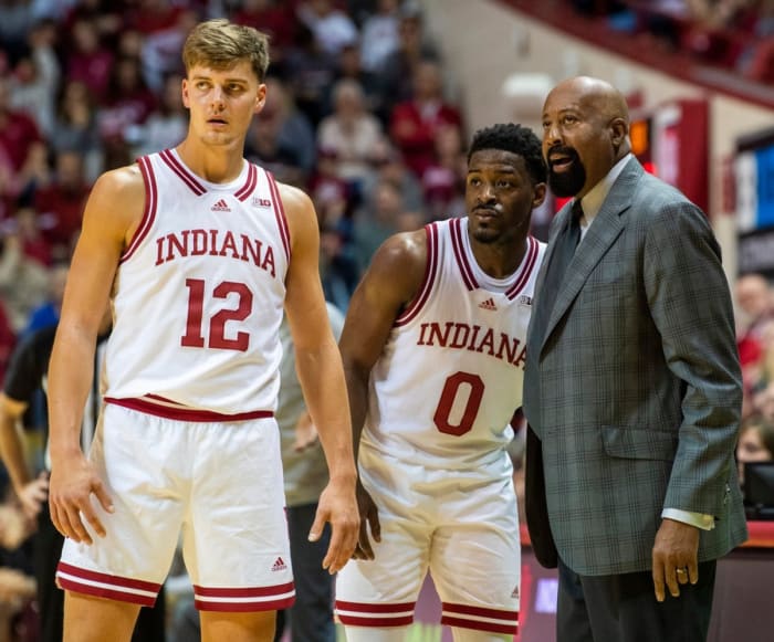 Indiana coach Mike Woodson speaks to Xavier Johnson (0) and Miller Kopp (12) during a game.  (Rich Janzaruk/USA TODAY Sports)