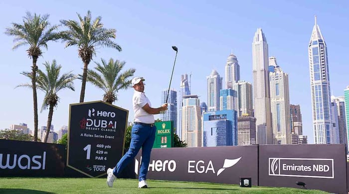 Richard Bland watches a tee shot at the 2023 Hero Dubai Desert Classic.
