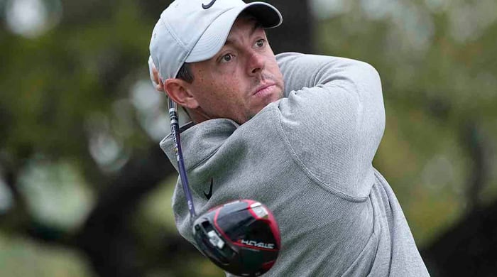 Rory McIlroy watches a drive at the 2023 World Golf Championships-Dell Match Play.