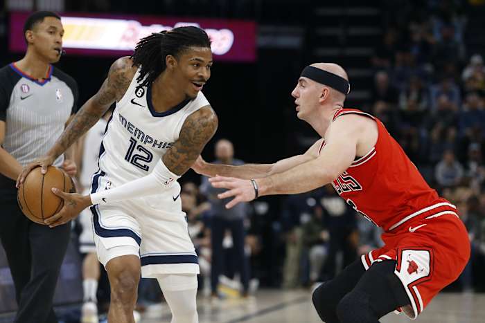 February 7, 2023; Memphis Grizzlies guard Ja Morant on offense against Chicago Bulls guard Alex Caruso at FedExForum