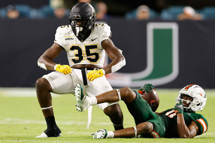 MIAMI GARDENS, FLORIDA - SEPTEMBER 11: Jalen McLeod #35 of the Appalachian State Mountaineers celebrates after tackling Charleston Rambo #11 of the Miami Hurricanes for a loss during the second half at Hard Rock Stadium on September 11, 2021 in Miami Gardens, Florida. (Photo by Michael Reaves/Getty Images)