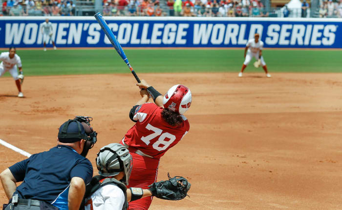 Jocelyn Alo, a senior from Oklahoma, takes a home run at the Women's College World Series