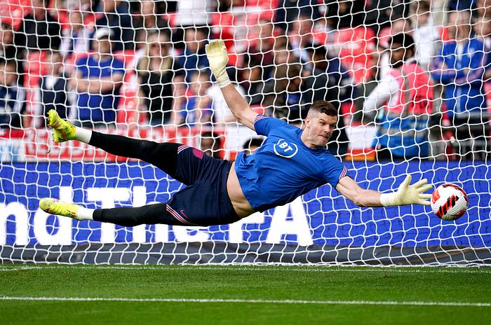 Fraser Forster pictured warming up ahead of England's game with Switzerland in March 2022