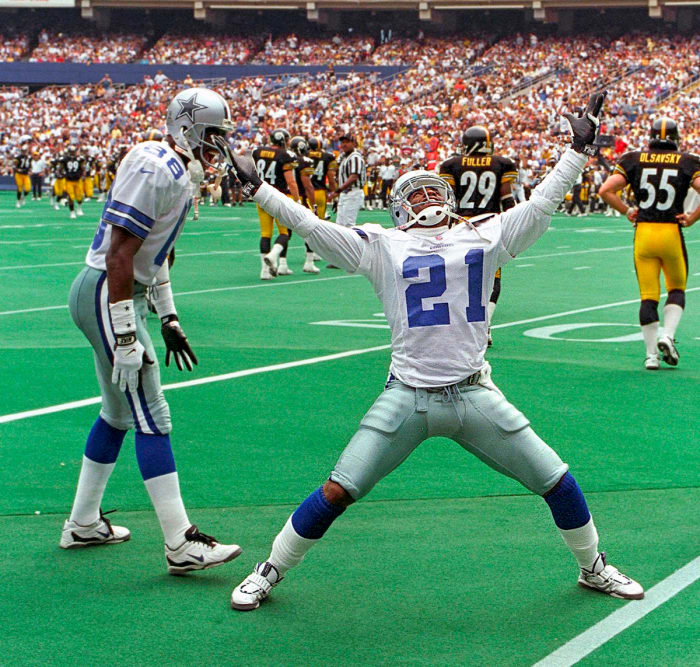 Deion Sanders, playing for the Cowboys, celebrates a play during a game in Pittsburgh.