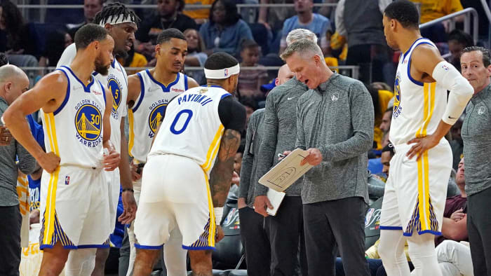Golden State Warriors head coach Steve Kerr talks to his team during the first quarter against the Boston Celtics.