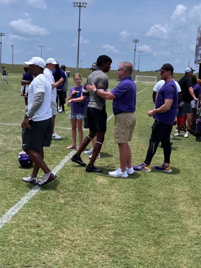 Woodlawn cornerback Jordan Matthews catches up with LSU head coach Brian Kelly at the LSU 7-on-7 camp Friday, June 10. 