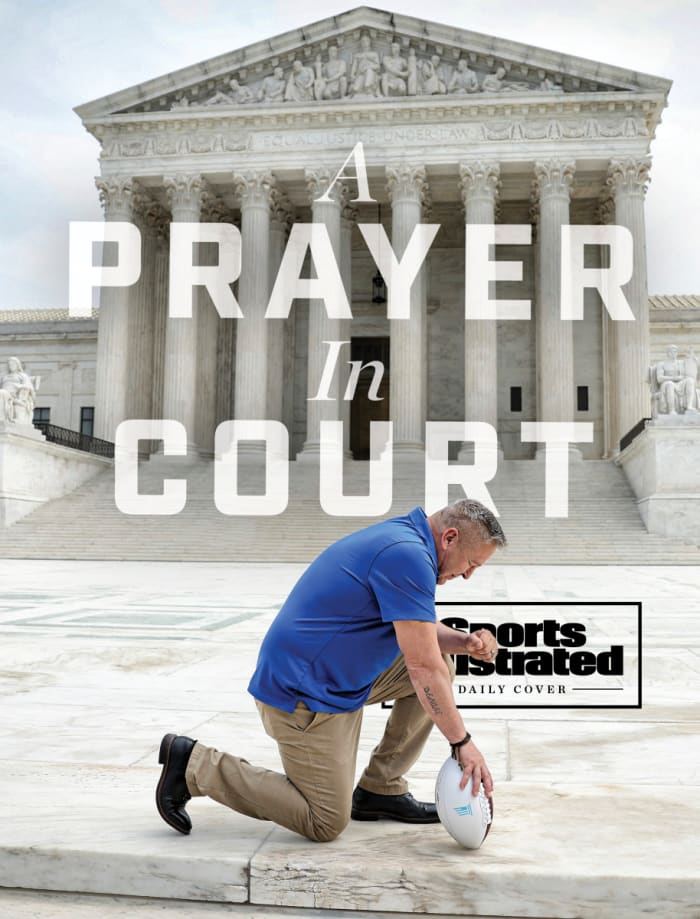 Joe Kennedy kneels in prayer in front of the U.S. Supreme Court building